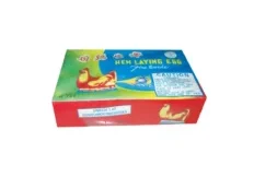 Hen laying egg